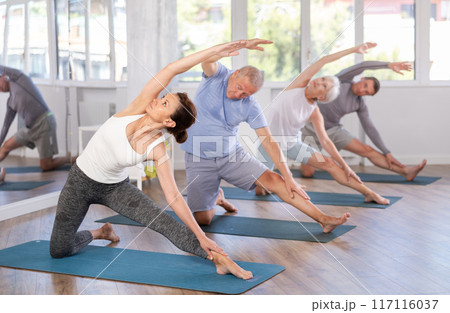 Adult woman doing pilates in group 117116037