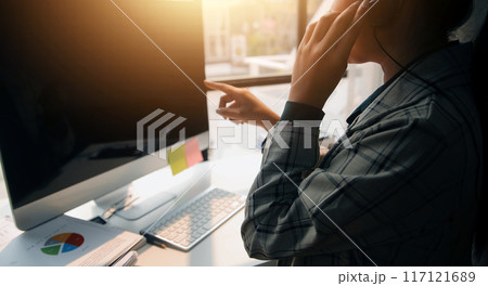 Call center, computer and business with woman in office for customer service, technical support and advice. Technology, contact us and communication with employee operator in help desk agency Call center, computer and business with woman in office for customer service, technical support and advice. Technology, contact us and communication with employee operator in help desk agency 117121689