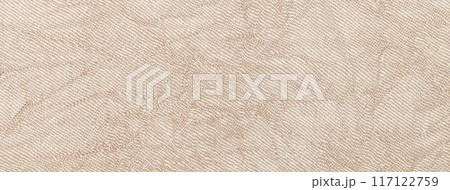 Light beige wavy background from textile material. Texture of pastel cream fabric with wrinkled pattern, macro. Light beige wavy background from textile material. Texture of pastel cream fabric with wrinkled pattern, macro. 117122759