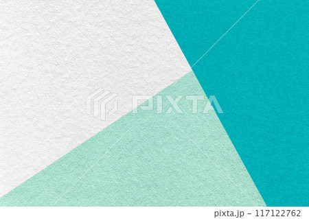 Texture craft white, mint and turquoise paper background, macro. Vintage abstract teal cardboard 117122762