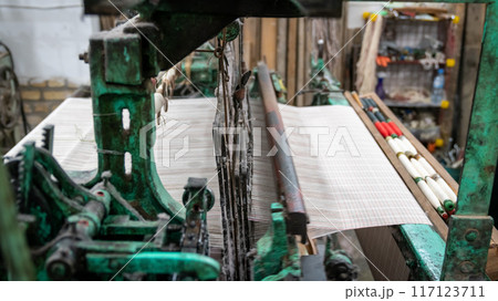 Weaving machine for household weaving, used for weaving Persian carpets in Yazd, Iran Weaving machine for household weaving, used for weaving Persian carpets in Yazd, Iran 117123711