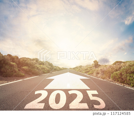 2025 target indicated by arrow on empty road. Coming into the new year, word 2025 on highway. 117124585