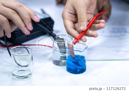 Electroplating experiment in chemistry laboratory. 117126272