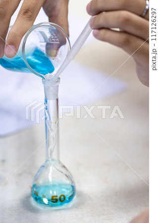 Electroplating experiment in chemistry laboratory. 117126297