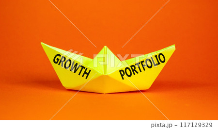 Growth portfolio symbol. Concept words Growth portfolio on beautiful yellow paper boat. Beautiful orange paper background. Business Growth portfolio concept. Copy space. 117129329