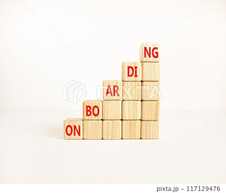 Onboarding success symbol. Concept word Onboarding on wooden blocks. Beautiful white background. Business onboarding success concept. Copy space. 117129476