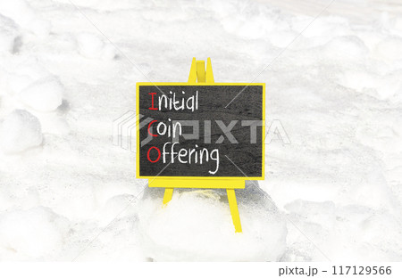 ICO initial coin offering symbol. Concept words ICO initial coin offering on beautiful yellow blackboard. Beautiful white snow background. Business ICO initial coin offering concept. Copy space. 117129566