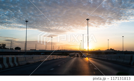 On the Thai highway with sunrise and cloudy sky. On the Thai highway with sunrise and cloudy sky. 117131813