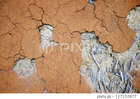 Dirty rustic and vintage orange grunge concrete wall texture and background Dirty rustic and vintage orange grunge concrete wall texture and background 117132677