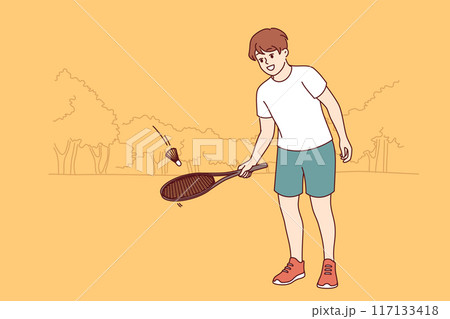 Boy plays tennis, hitting ball with tennis racket and dreaming of becoming professional player 117133418