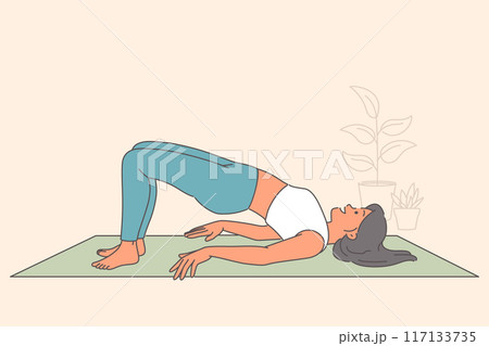 Woman does pilates on yoga mat, showing flexibility and feeling better through stretching Woman does pilates on yoga mat, showing flexibility and feeling better through stretching 117133735