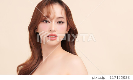 Beautiful young asian woman with clean fresh skin on beige background, Face care, Facial treatment, Cosmetology, beauty and spa, Asian women portrait. 117135028
