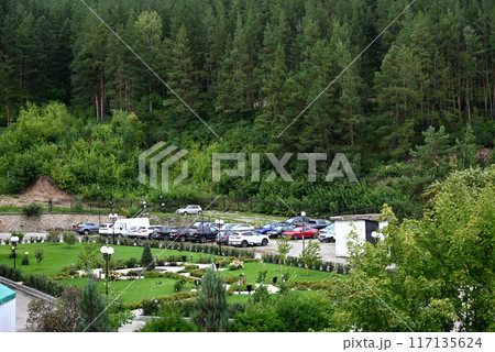 Cars standing in a quarry at dawn. Autotourism in the Mountains. Cars standing in a quarry at dawn. Autotourism in the Mountains. 117135624