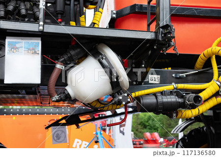 Fragment of yellow industrial diesel engine for electrical generator in power station Fragment of yellow industrial diesel engine for electrical generator in power station 117136580