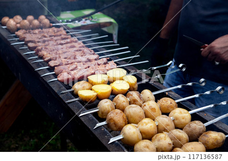 Tasty shish kebab cooking process. Grilled meat 117136587