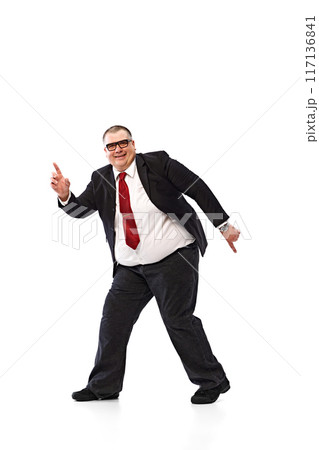 New ideas, innovative approach. Businessman in formal wear and glasses in motion with raising finger isolated on white background. 117136841