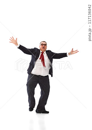Catching new opportunities. Full-length of emotional fat businessman in black suit and glasses, spreading hands with emotive face isolated on white background. Catching new opportunities. Full-length of emotional fat businessman in black suit and glasses, spreading hands with emotive face isolated on white background. 117136842