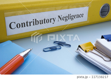 Yellow folder with label contributory negligence. 117138217