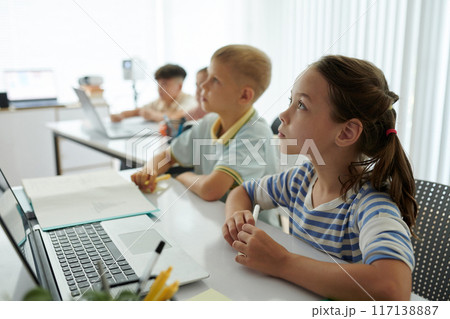 Children Attending Online Learning Session in Classroom 117138887