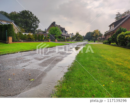 Andervenne, Germany, a street after the rain. 117139296