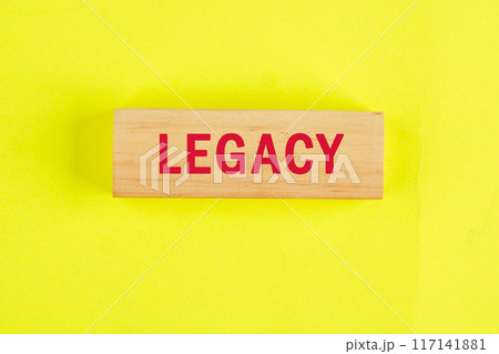 Legacy written a conceptual phrase on the wooden blocks, top view 117141881