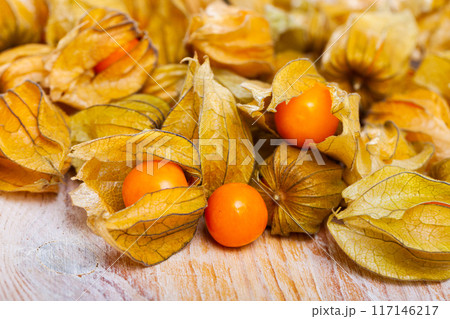Cape gooseberry physalis on wooden background Cape gooseberry physalis on wooden background 117146217