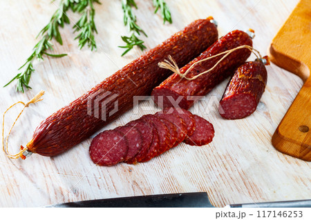 Russian raw smoked sausage with fresh herbs Russian raw smoked sausage with fresh herbs 117146253