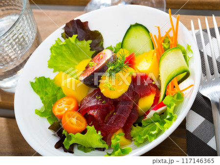 Tuna salad with vegetables and fruits Tuna salad with vegetables and fruits 117146365