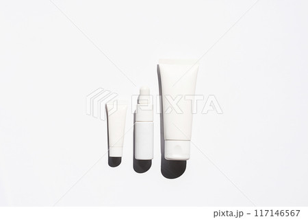 Minimalist skincare product packaging on white background. 117146567