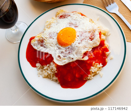 Delicious rice with sauce and fried eggs 117146942