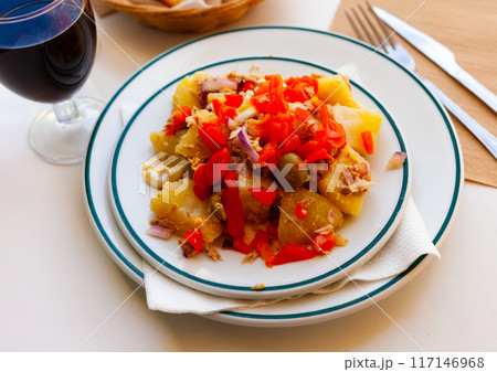 Salad with boiled potatoes, eggs, canned tuna, olives, bell peppers, onions Salad with boiled potatoes, eggs, canned tuna, olives, bell peppers, onions 117146968