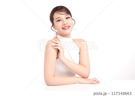 Beautiful young asian woman with clean fresh skin on white background, Face care, Facial treatment, Cosmetology, beauty and spa, Asian women portrait. Beautiful young asian woman with clean fresh skin on white background, Face care, Facial treatment, Cosmetology, beauty and spa, Asian women portrait. 117148663