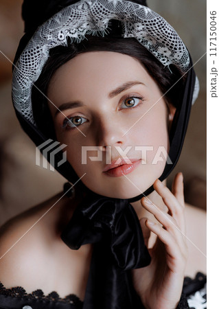 Portrait elegant baroque lady in lavishlace gown. 117150046