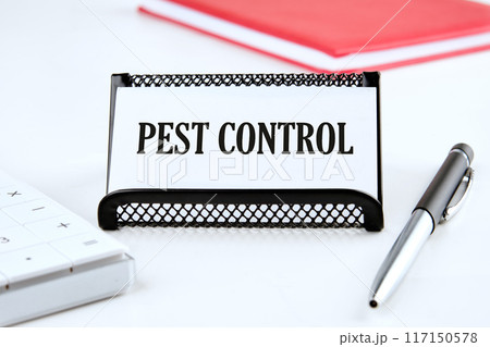 Conceptual caption Pest Control. Word PEST CONTROL Written on a business card on a white background Conceptual caption Pest Control. Word PEST CONTROL Written on a business card on a white background 117150578