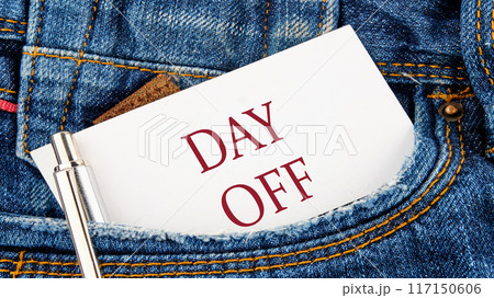 Business and Day off concept. Copy space. DAY OFF symbol on a piece of paper from a jeans pocket 117150606