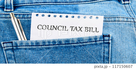 Business and finance concept. COUNCIL TAX BILL text written on a piece of paper sticking out of a jeans pocket 117150607