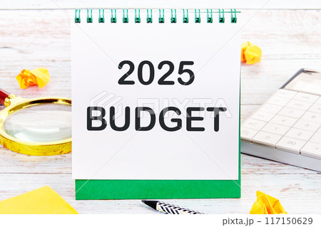 Conceptual budget 2025 symbol. Copy space. Budget 2025 words written on a blank sheet in a notebook 117150629
