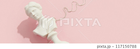Creative composition with pendant on pink background. Trendy jewelry in minimalist style 117150788