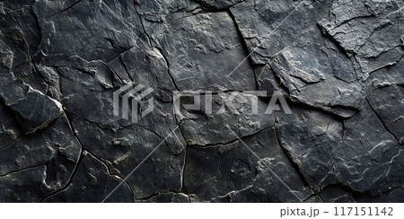 Textured black slate rock surface, great for natural and geological themed backgrounds 117151142