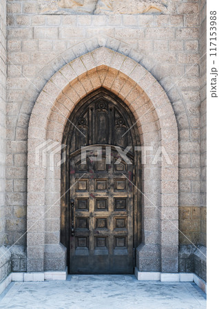 ancient iron door to Cathedral of the Sacred Heart of Jesus in Tashkent in Uzbekistan ancient iron door to Cathedral of the Sacred Heart of Jesus in Tashkent in Uzbekistan 117153988