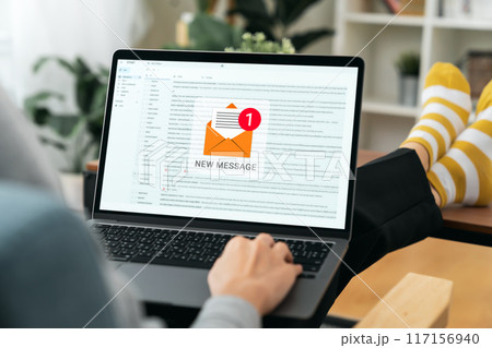 Businessman hand using computer laptop and shows a digital screen of new email notifications. 117156940