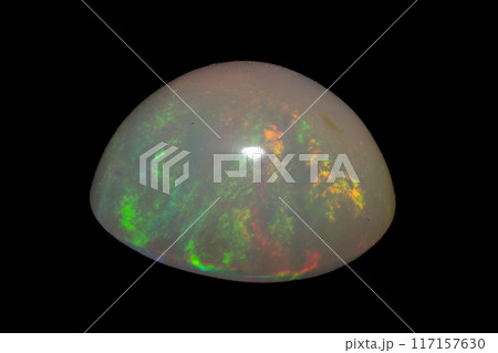 natural rainbow opal gem isolated on black background natural rainbow opal gem isolated on black background 117157630
