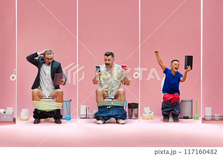 Three fans on toilets, surprised businessman with tablet, man with drink and phone in Hawaiian shirt, and cheering boy, all immersed in excitement of game. 117160482