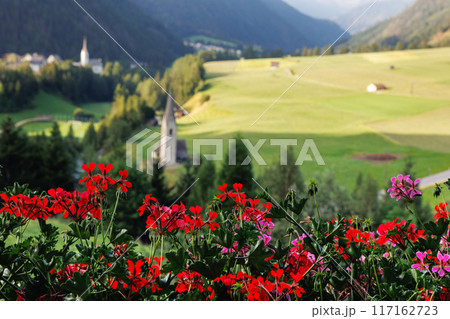 Scenic panorama alpine view flower decorated balcony austrian mountain village Kals am Grossglockner valley blue sky background. Austria Apls tirol National park nature. Summer autumn hiking tourism Scenic panorama alpine view flower decorated balcony austrian mountain village Kals am Grossglockner valley blue sky background. Austria Apls tirol National park nature. Summer autumn hiking tourism 117162723