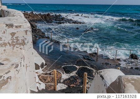 The coast near the village of Arrieta, Lanzarote, Canary Islands The coast near the village of Arrieta, Lanzarote, Canary Islands 117163328