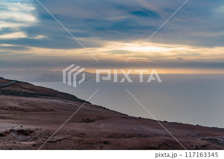 Sunset over the landscape around Mirador del Rio on the island of Lanzarote, Canary Islands 117163345