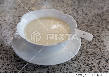 Steamed milk pudding curd dessert is popular sweet dessert especially among ethnic Chinese Steamed milk pudding curd dessert is popular sweet dessert especially among ethnic Chinese 117164105