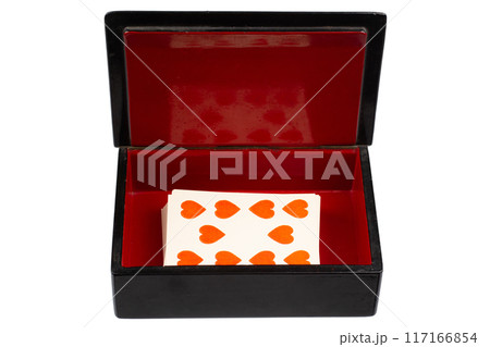 vintage old black and red casket with vintage playing cards 117166854