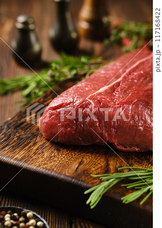 Closeup view of raw fresh beef flat iron steak Closeup view of raw fresh beef flat iron steak 117168422