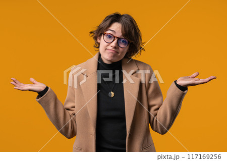 Can't help, dont know. Difficult question, guilty reaction,puzzled businesswoman 117169256